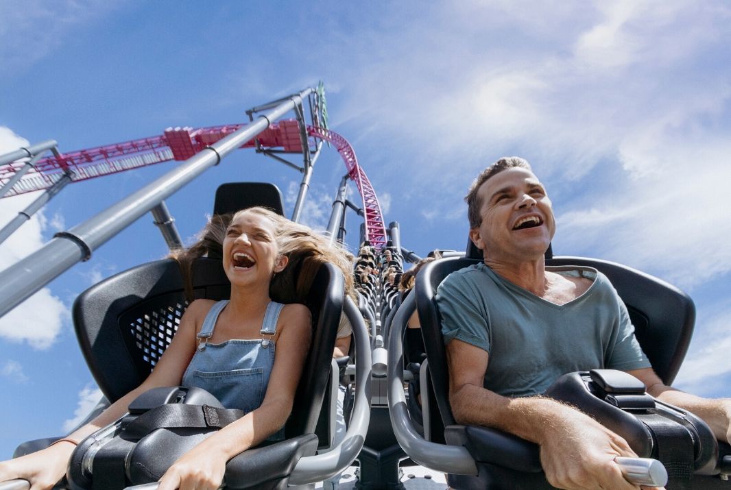 Dad and daughter on Roller Coaster at Theme Park Gold Coast