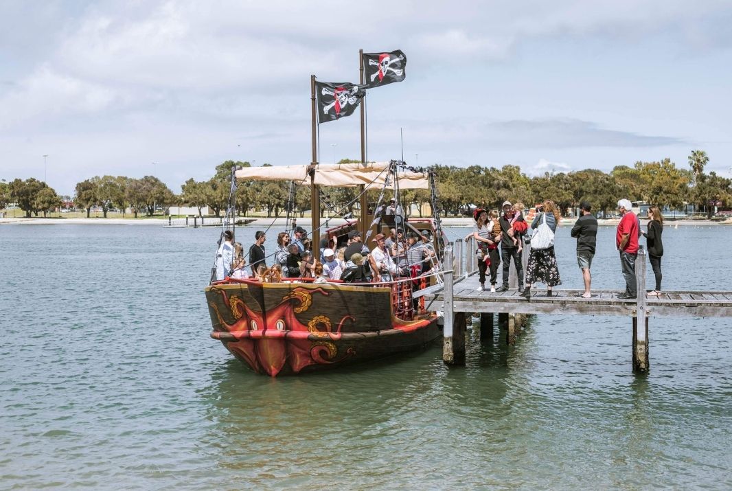 Tour group boarding Mandurah Pirate Cruise ship in Perth