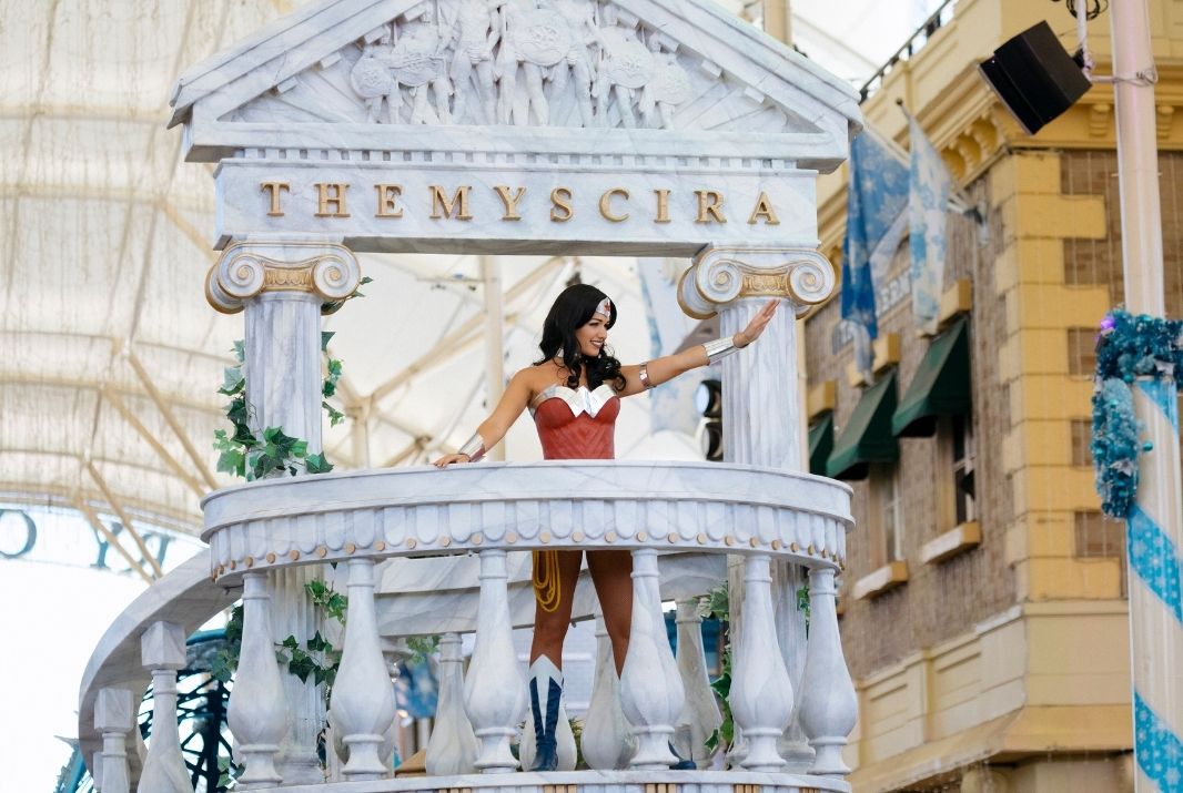 Wonder Woman standing on parade float Warner Bros. Movie World
