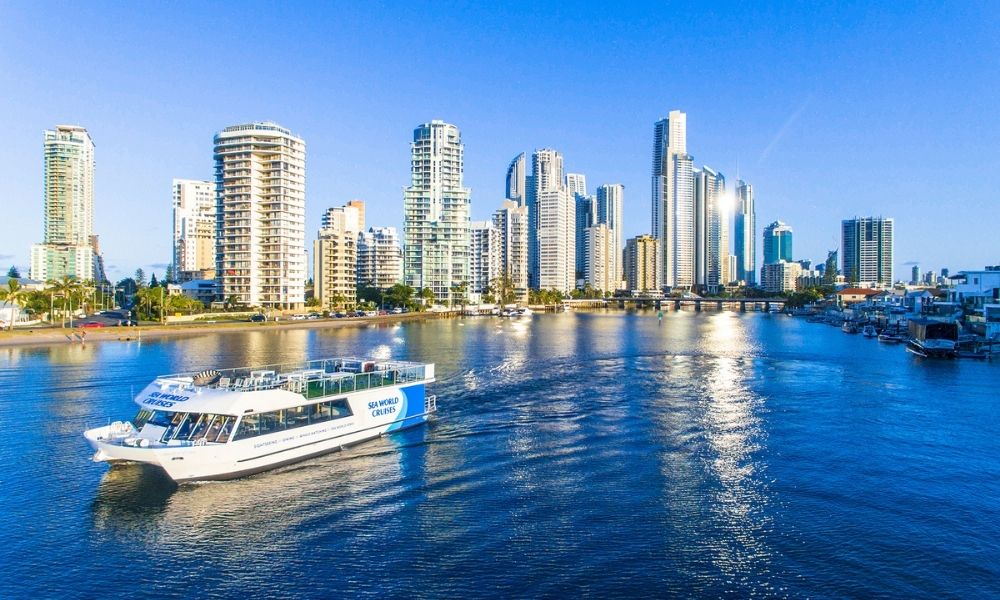 Aeriel view of a Gold Coast sightseeing cruise and Surfers Paradise Skyline