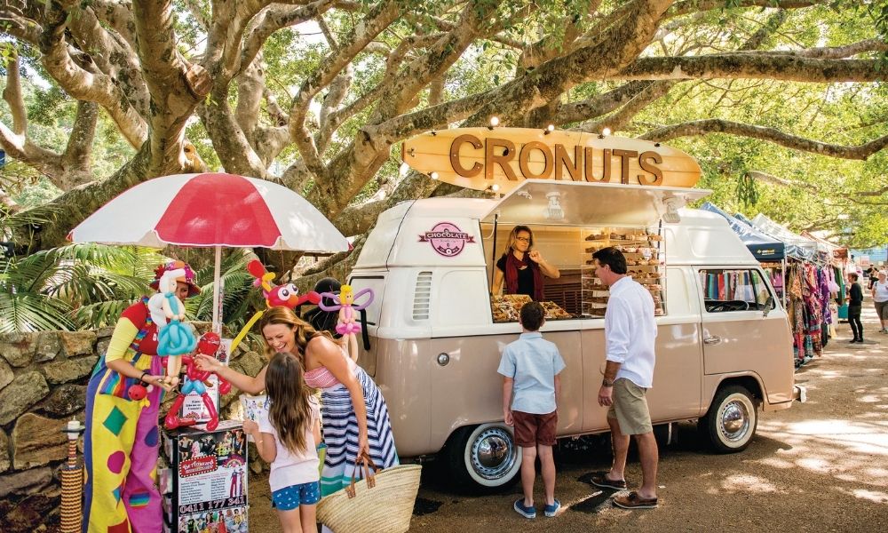 Family purchase cronuts from food truck at Eumundi Markets