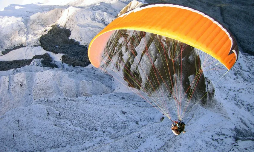 Winter Paragliding at Coronet Peak Queenstown - Book Now | Experience Oz