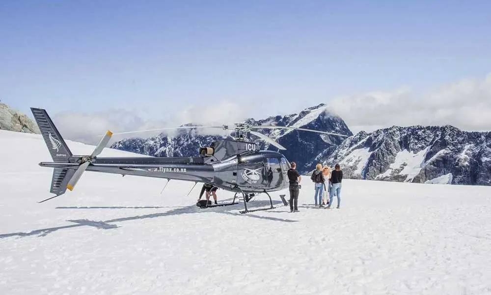 Helicopter Flight & Alpine Snow Landing Queenstown | Everything New Zealand-1