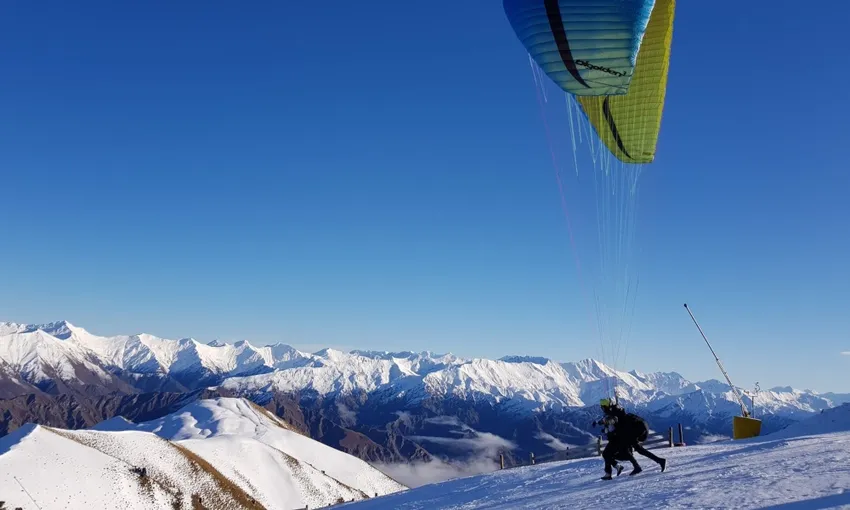 Winter Paragliding from Coronet Peak Queenstown | Everything New Zealand