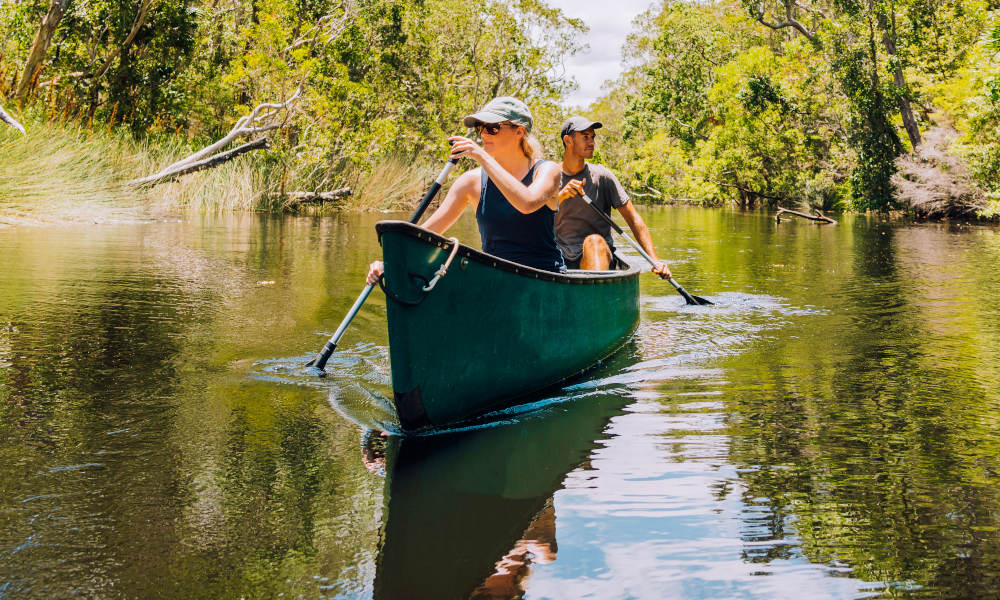 Everglades couple on canoe