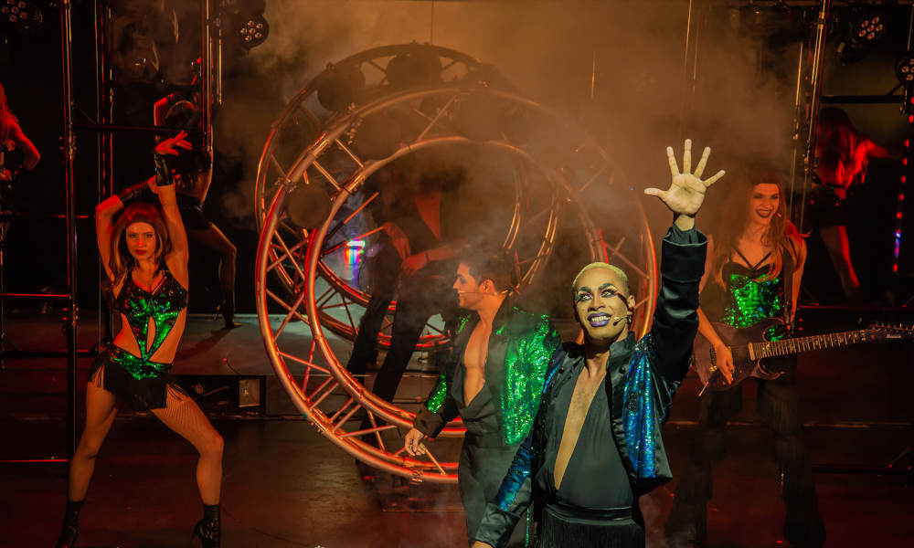 Draculas Gold Coast Muertos 2019 Cast with Metal Ring and Green Outfits