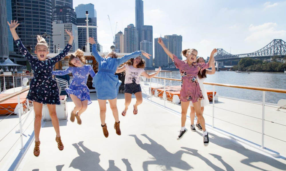 kookaburra river queens lunch cruise jumping in the air