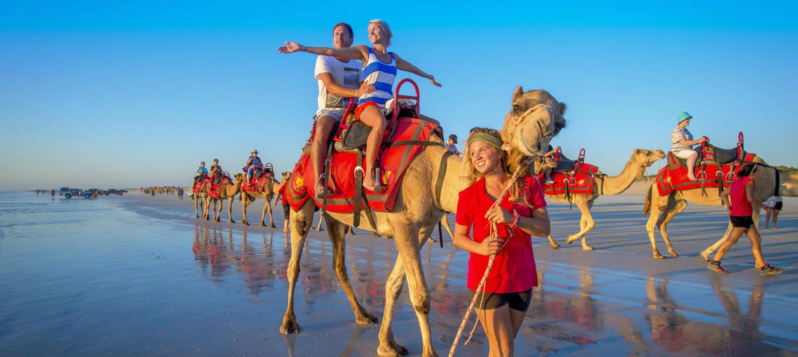 Take a Sunset Ride with Red Sun Camels