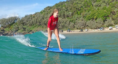 Learn to Surf on Rainbow Beach